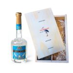 Premium gin in wooden box with tumbler